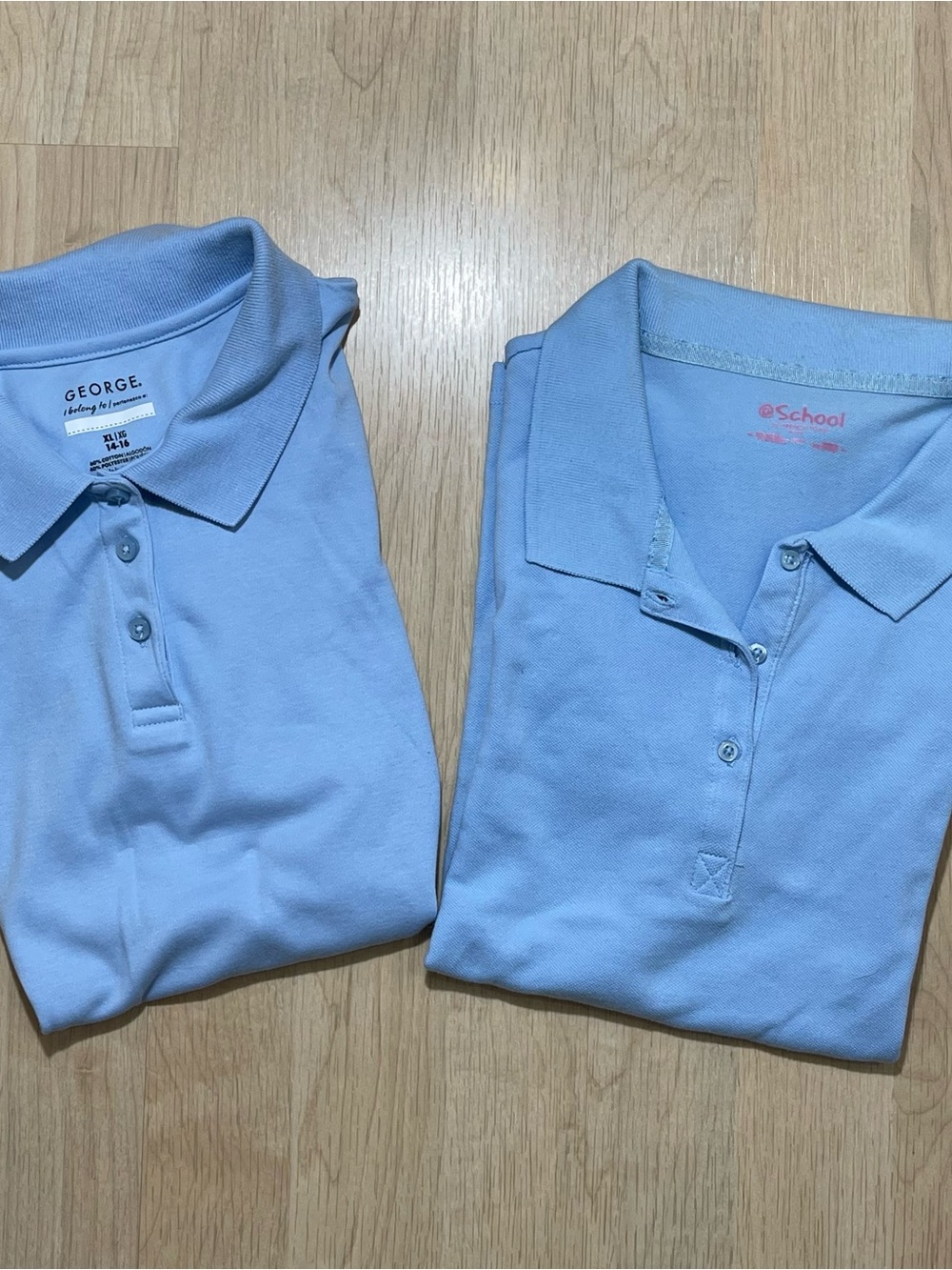 Light Blue Polo Tops (2)